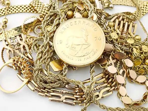 Gold, platinum, and silver coins and flatware